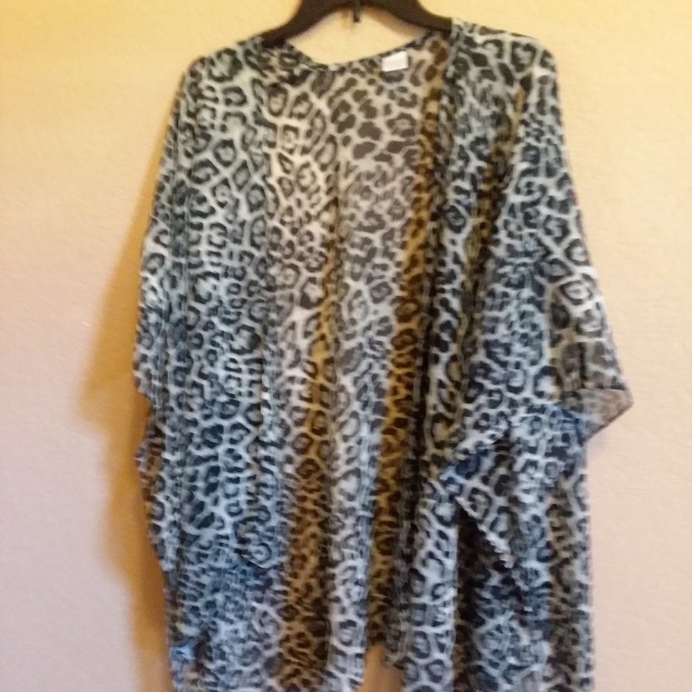 Over garment, kind of like a ruana